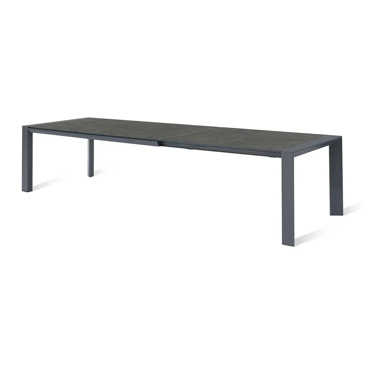 Rectangular black extendable dining table with metal frame and ceramic top on white background