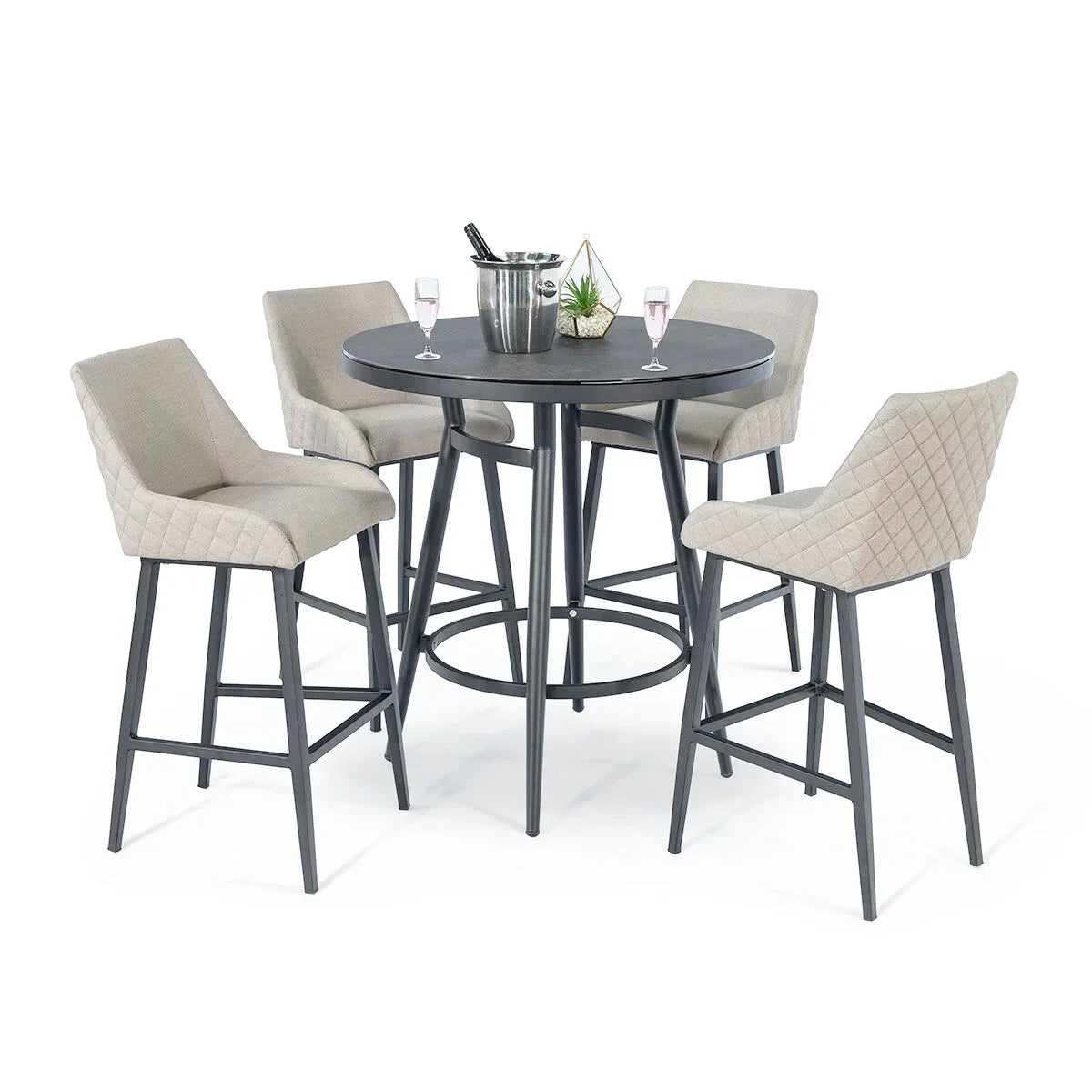 Round bar table with black metal base and four beige upholstered bar stools
