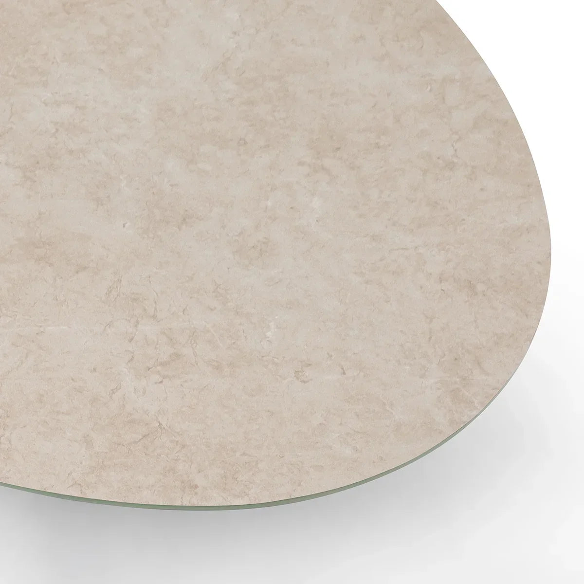 Beige stone effect dining table top with rounded edge close-up