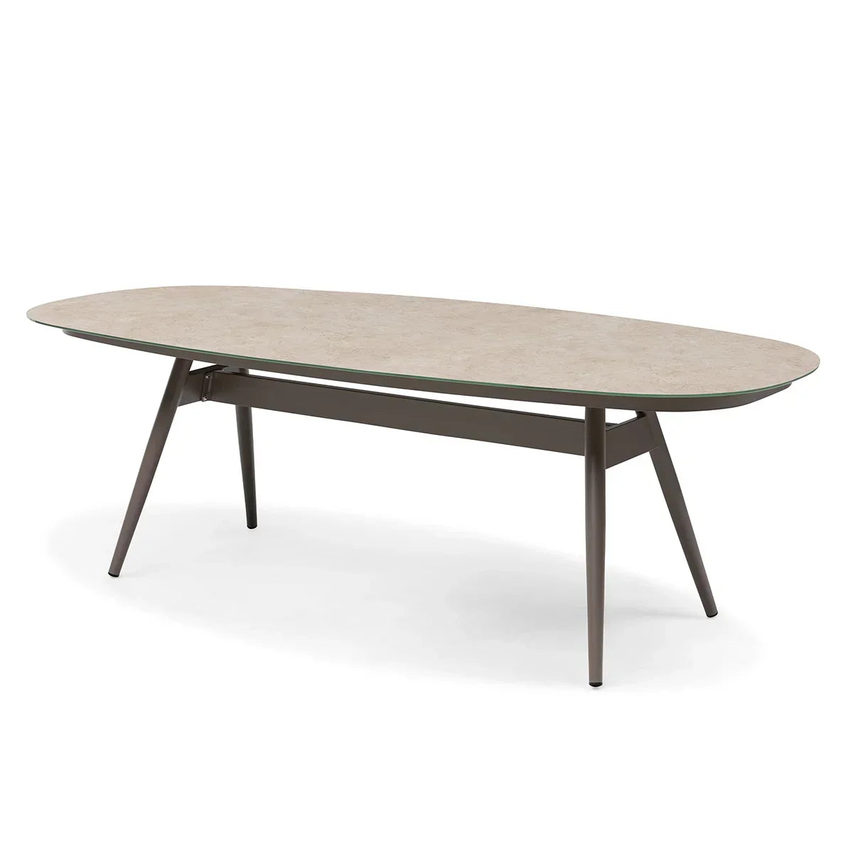 Oval dining table with beige stone effect top and angled dark metal legs