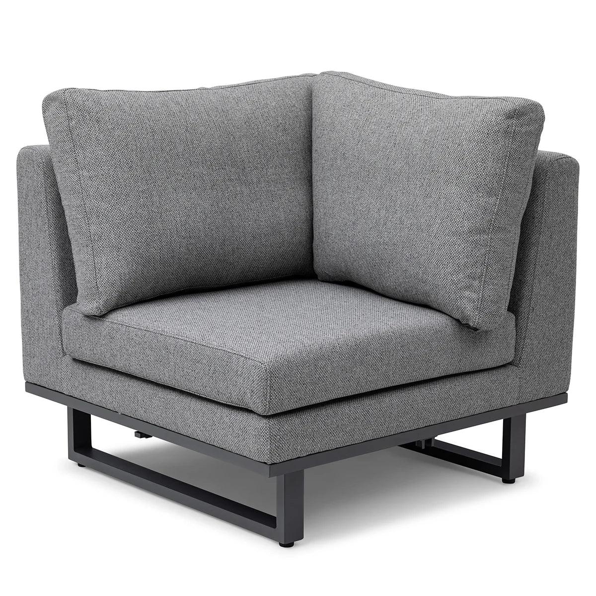 Grey corner sofa chair with metal legs and thick fabric cushions