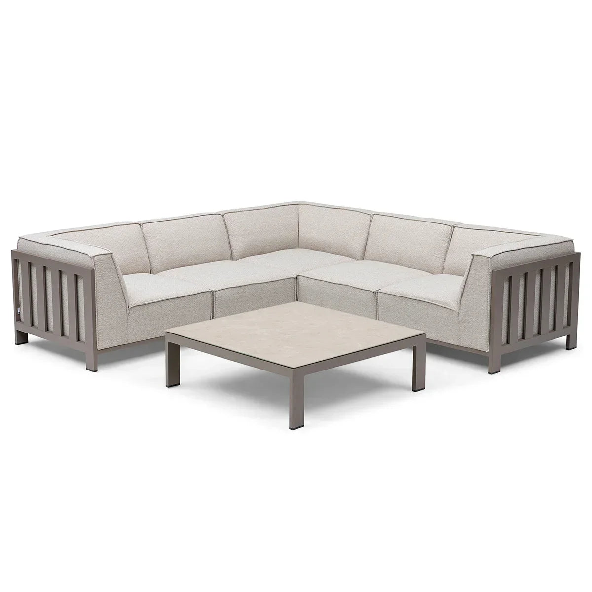 Beige corner sofa set with metal frame and low square coffee table on white background