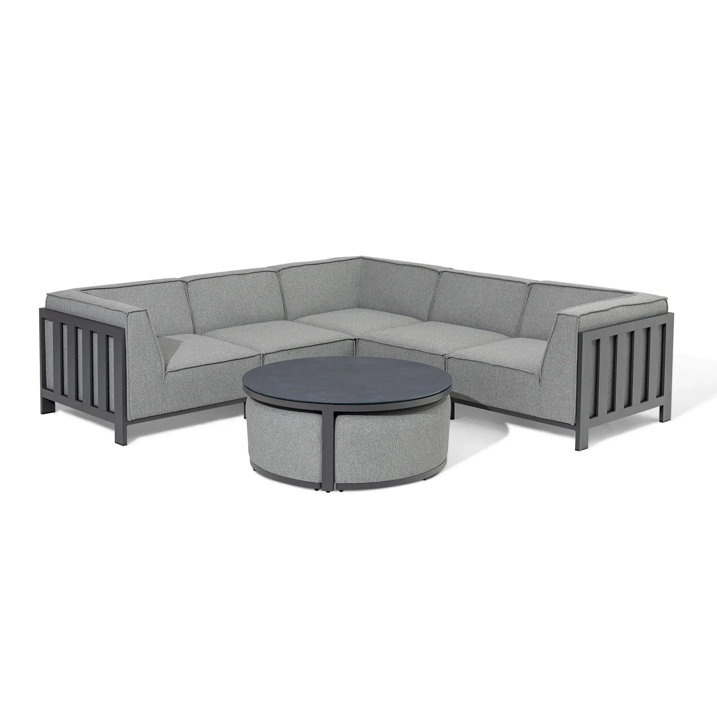Grey corner outdoor sofa set with matching round coffee table on white background