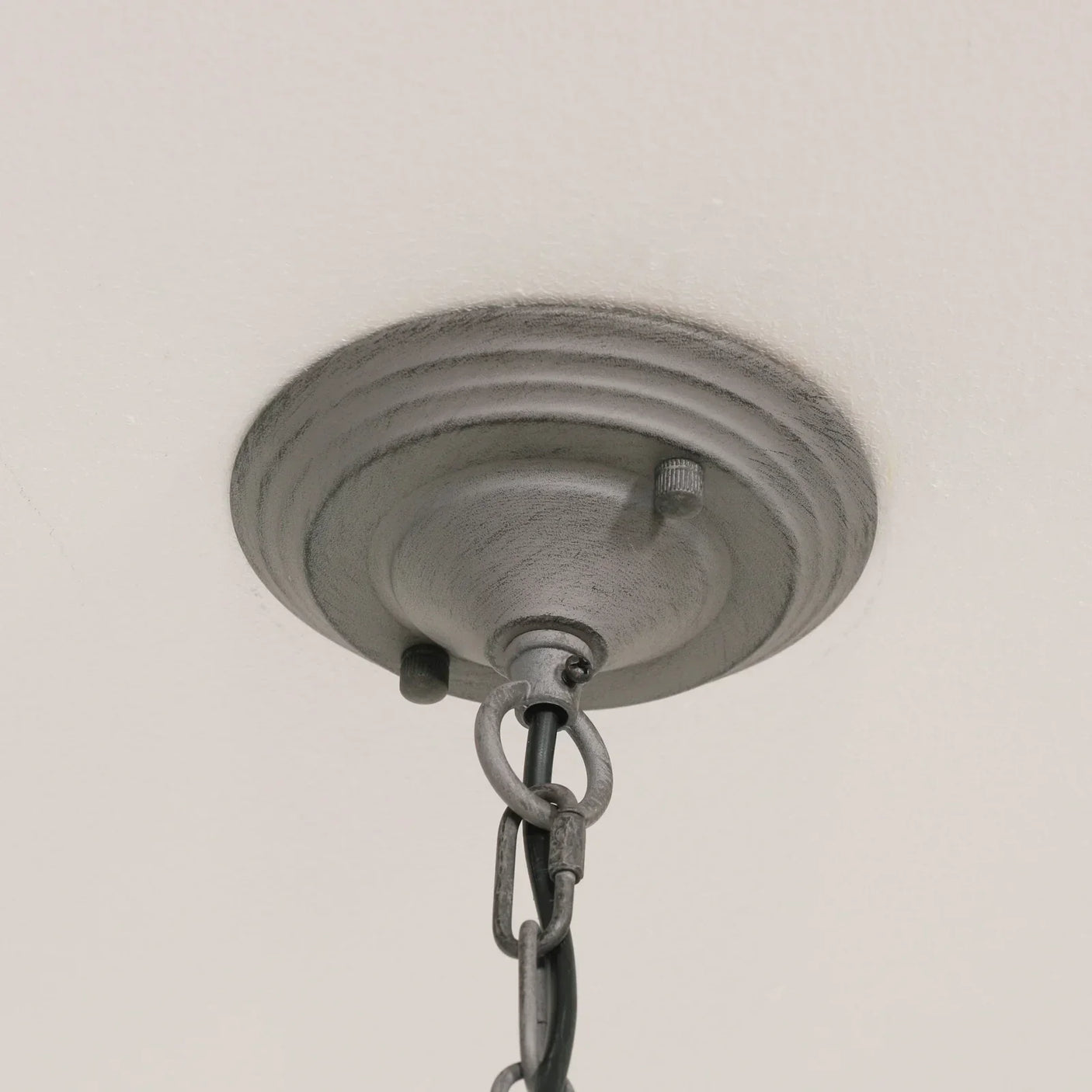 Brushed metal ceiling rose with black chain for pendant lighting fixture