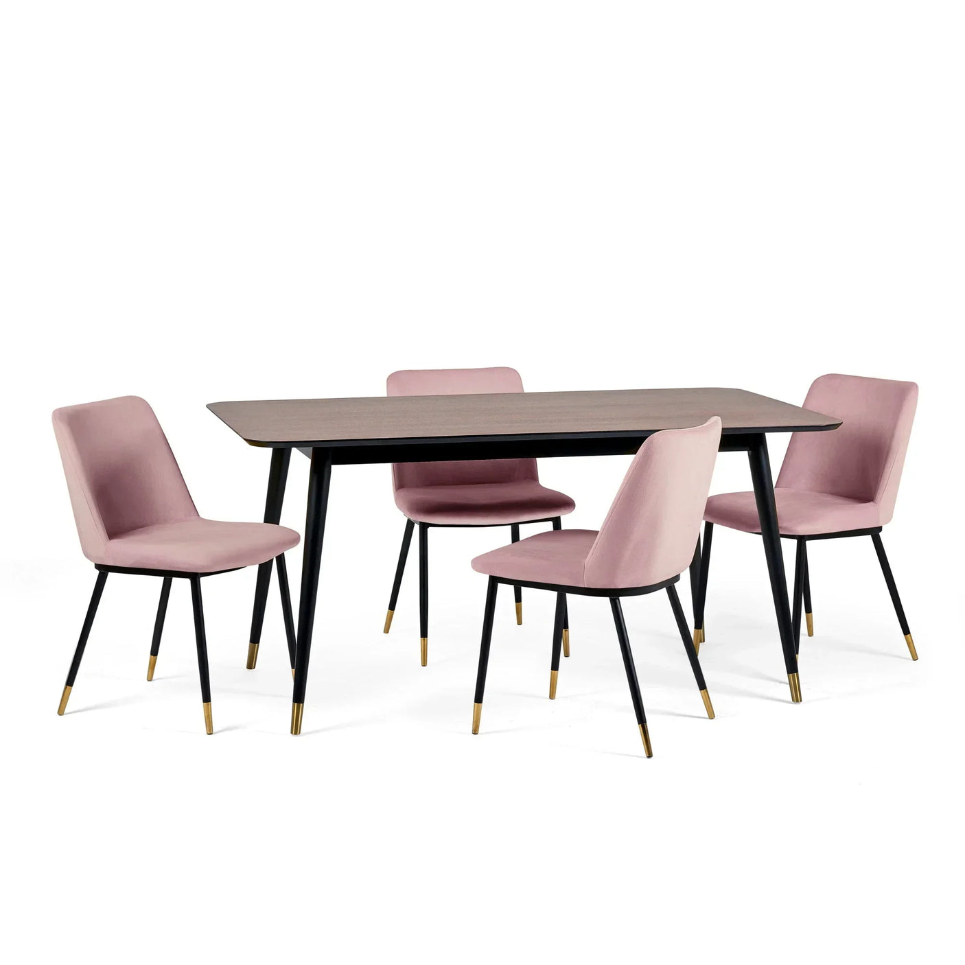 Rectangular dining table with black legs and four pink velvet dining chairs with gold tips