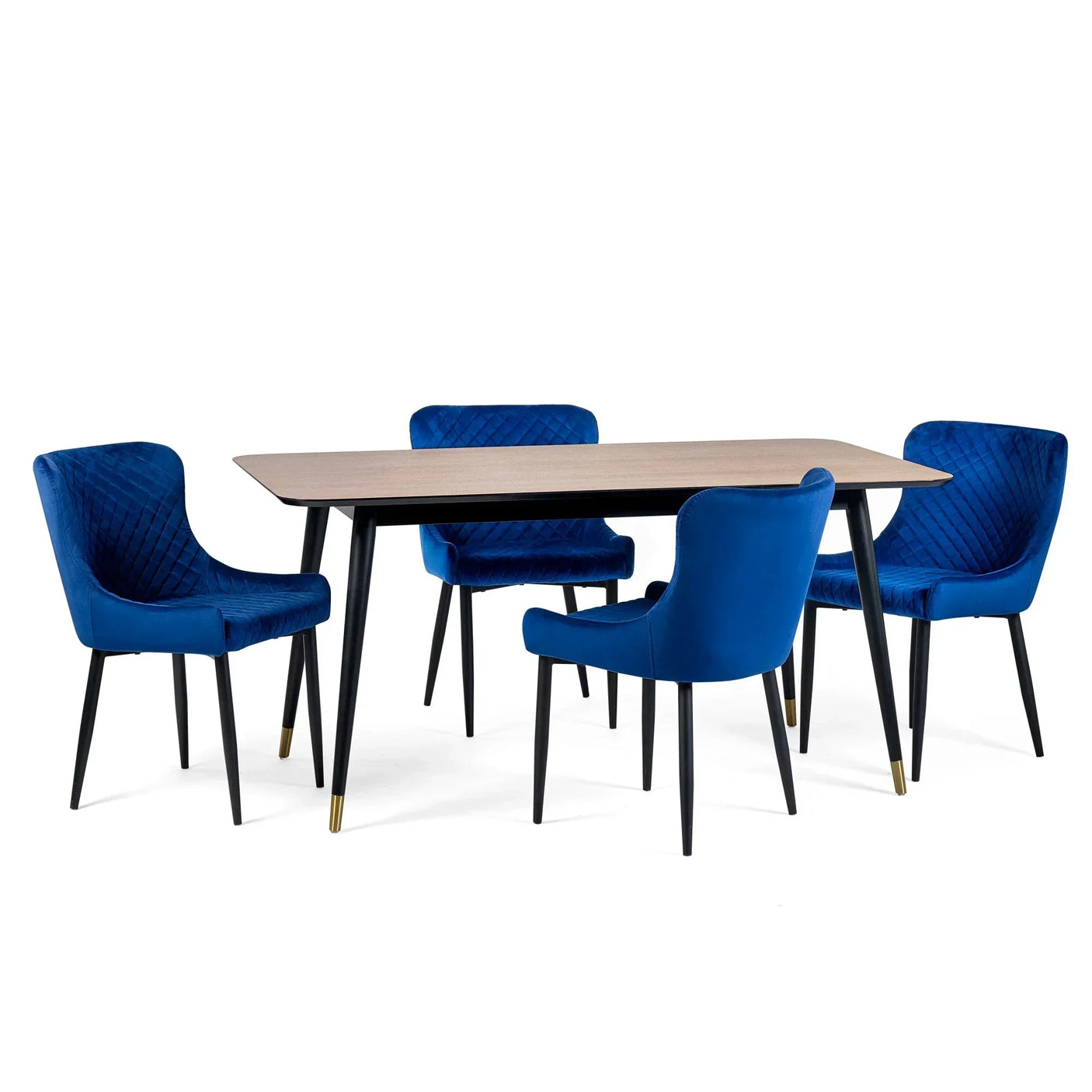 Rectangular dining table with wood top and four blue velvet chairs with black legs