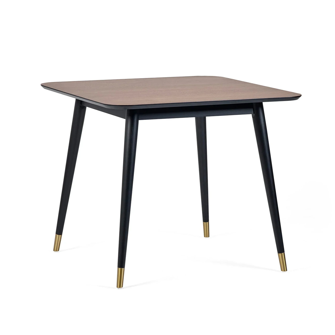 Square dining table with wood top and black tapered legs featuring gold metal caps