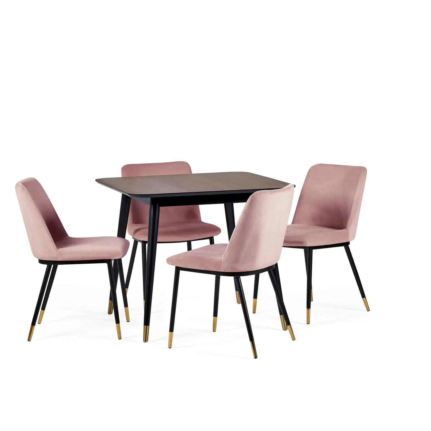 Square dining table with black legs and four blush pink velvet chairs with gold-tipped legs