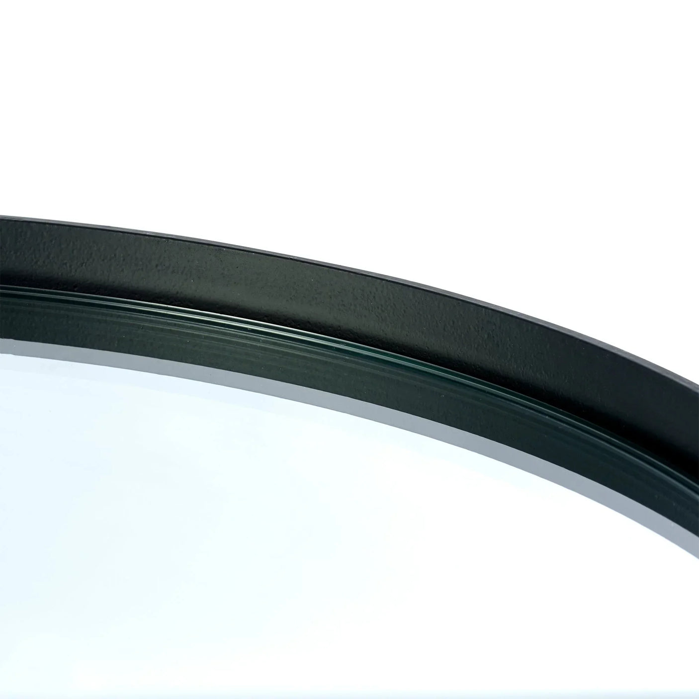Curved black metal frame detail on mirror glass lamp table top
