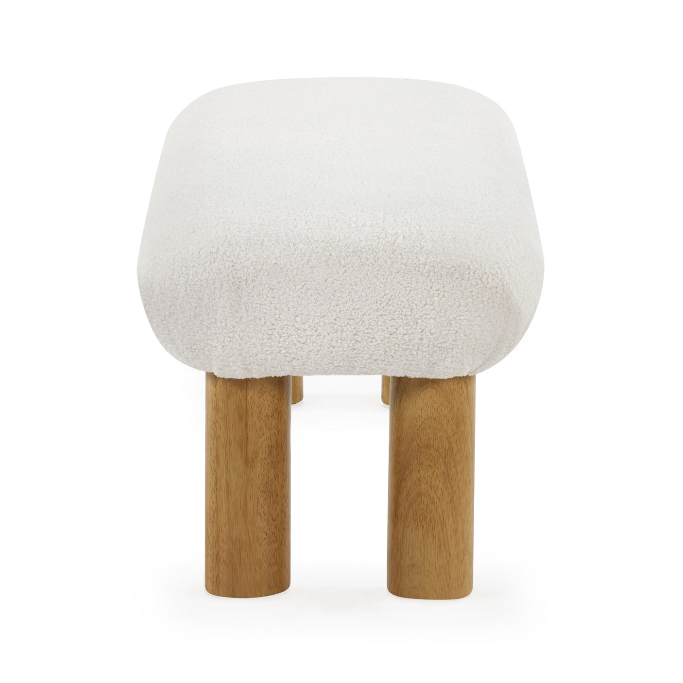 Low bench with cream boucle fabric and round wooden legs viewed from narrow end on white background.