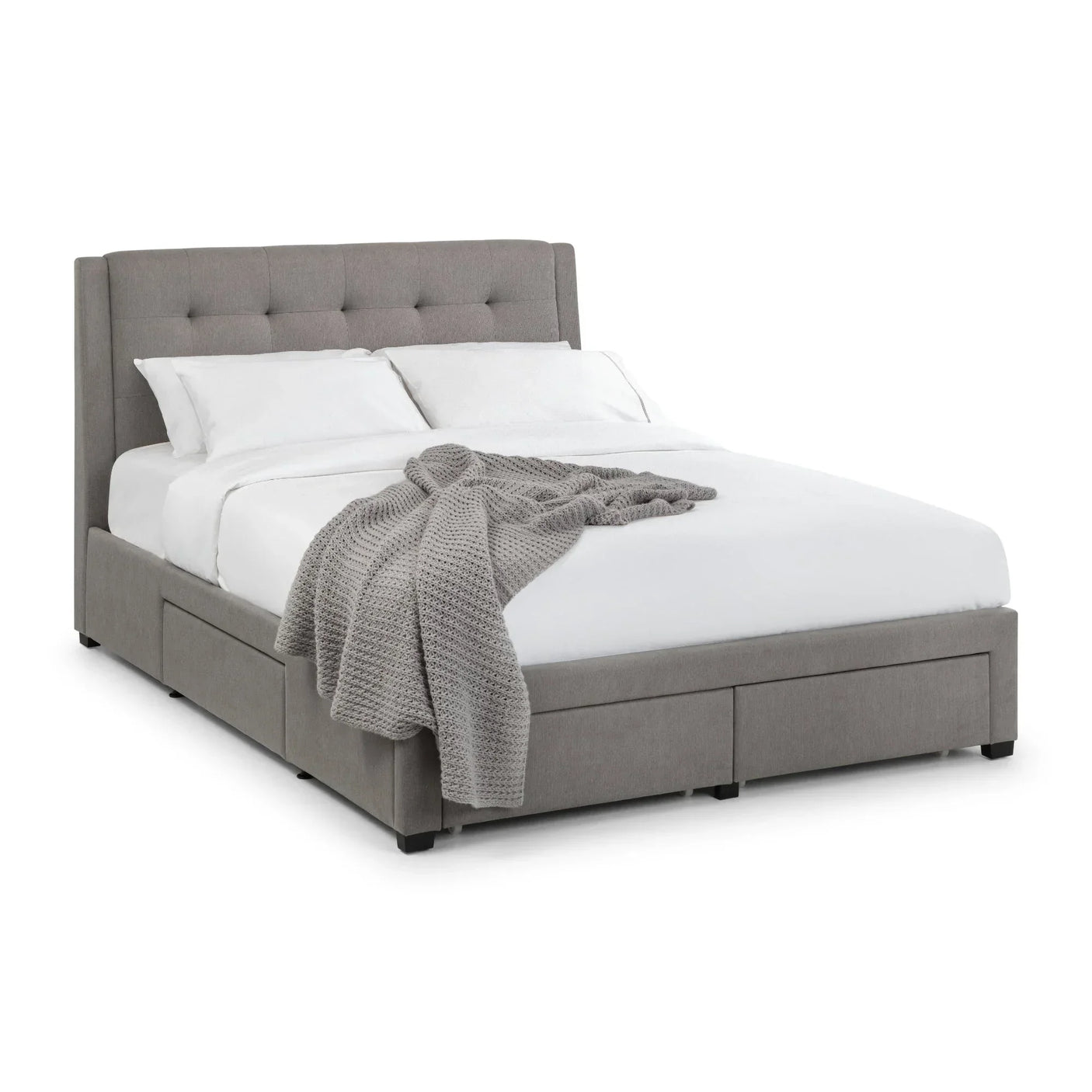 Grey double bed with four storage drawers, tufted headboard, white bedding and knit throw