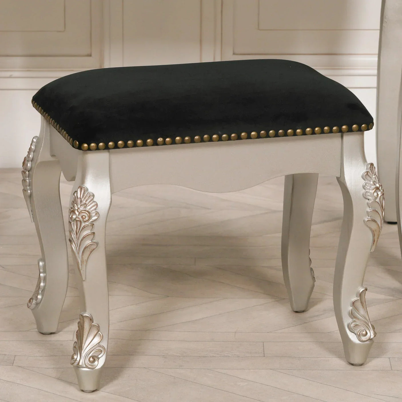 Silver dressing table stool with black velvet seat and ornate carved legs