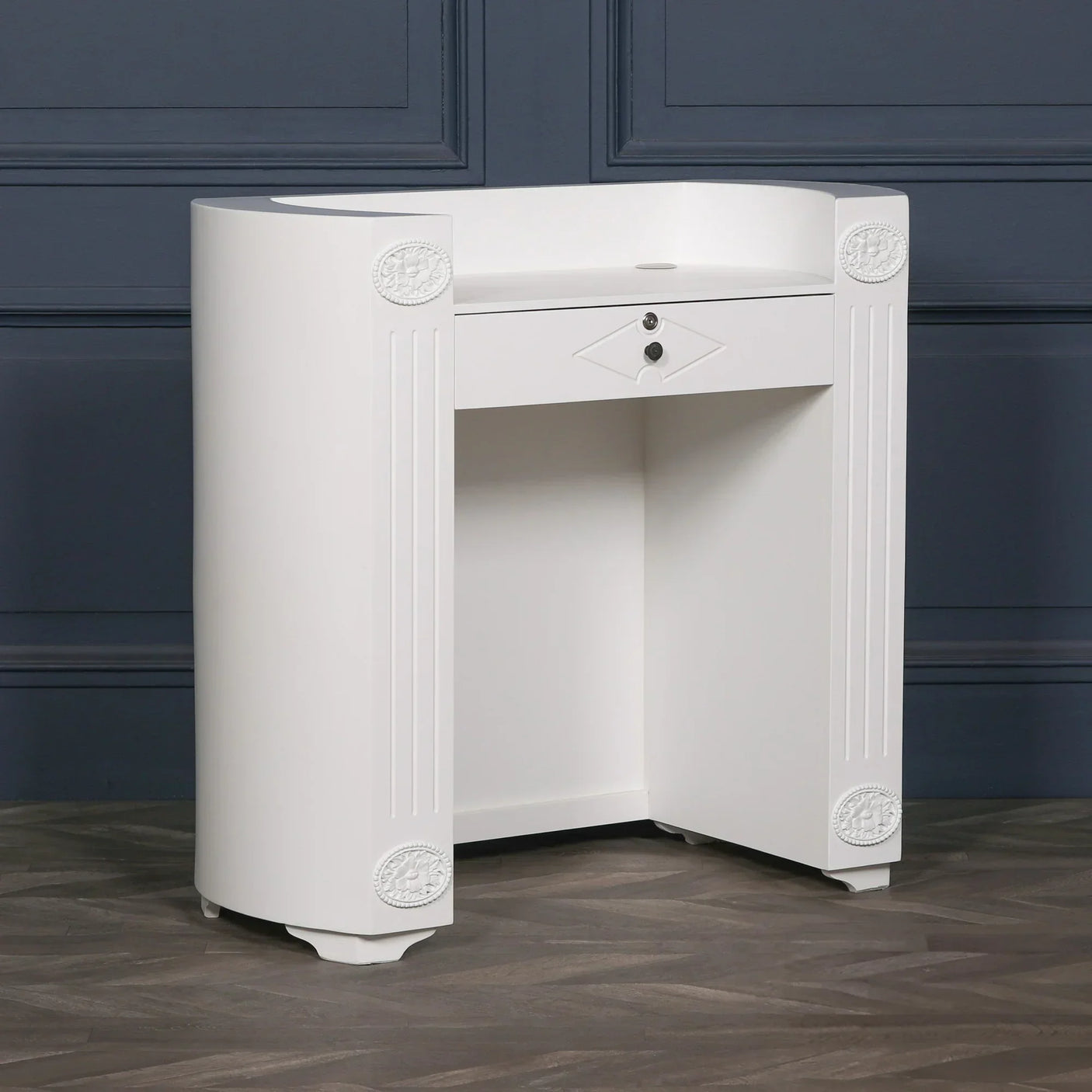 White wooden dressing table with single drawer and decorative embossed corner details