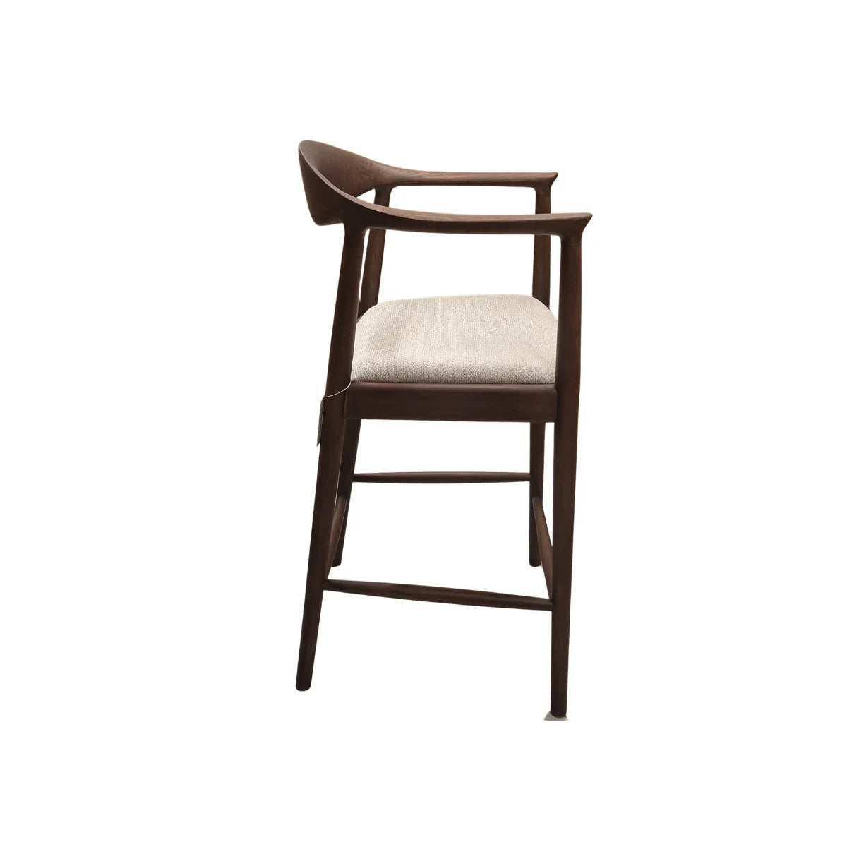 Walnut wood barstool with curved backrest and beige upholstered seat, side view
