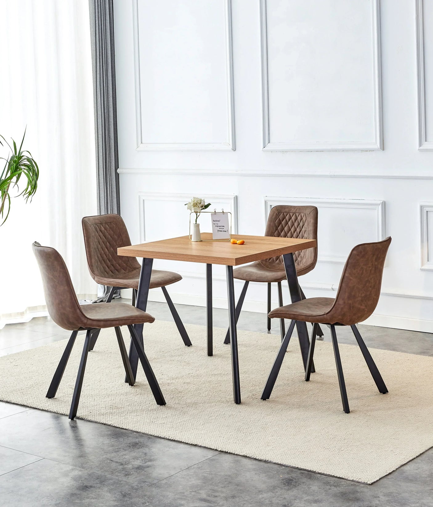 Square oak dining table with four retro brown chairs on cream rug in modern room