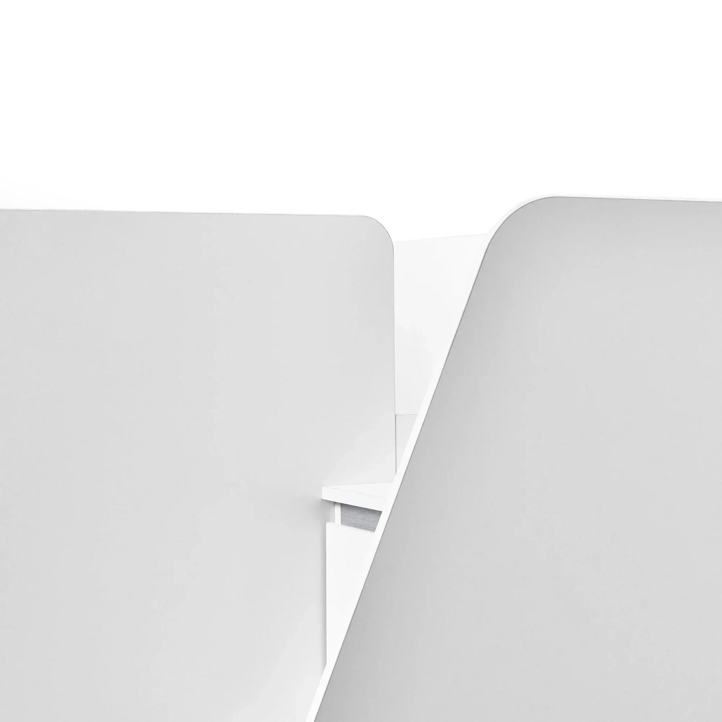 White corner of modern office desk partition with rounded edges
