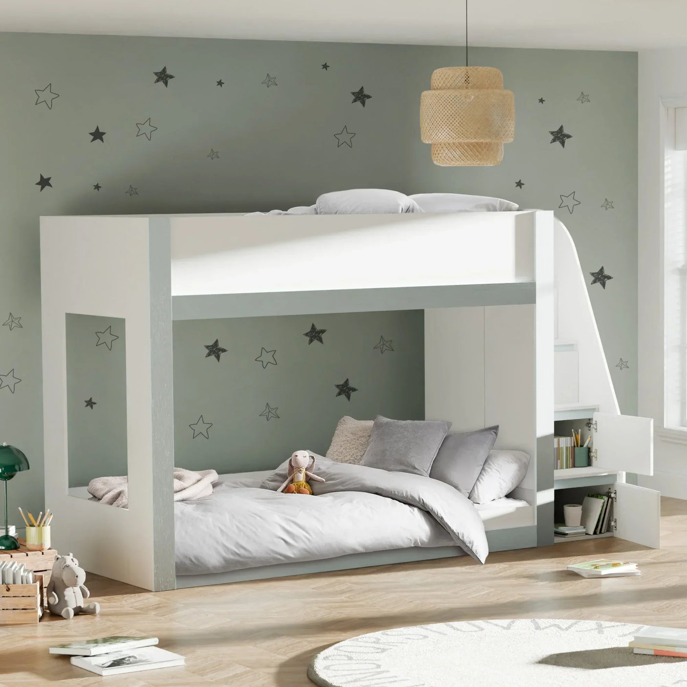 White and grey bunk bed with storage in modern kids room, star decals on wall