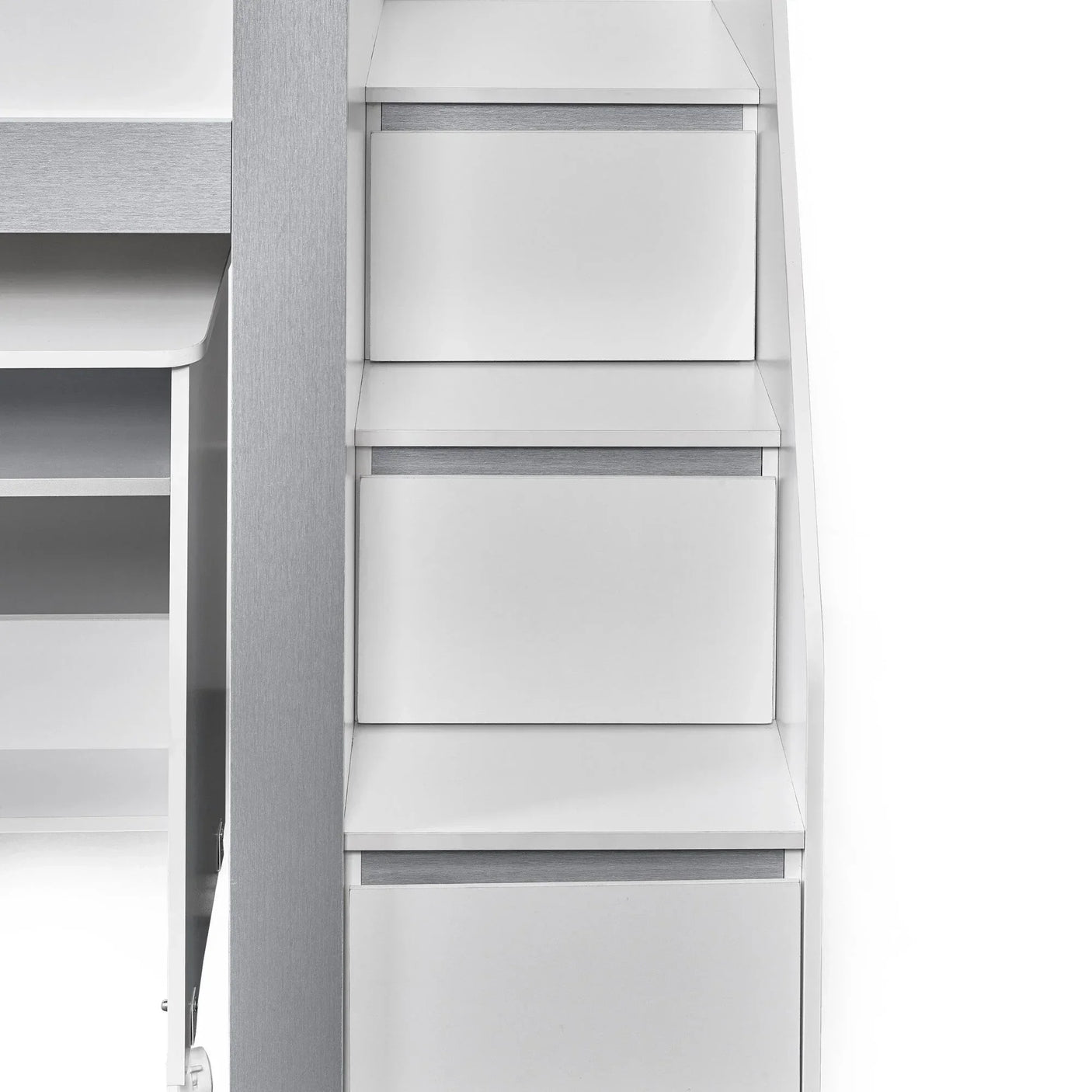 White wooden chest of drawers with modern handle-free design, shown in partial side view