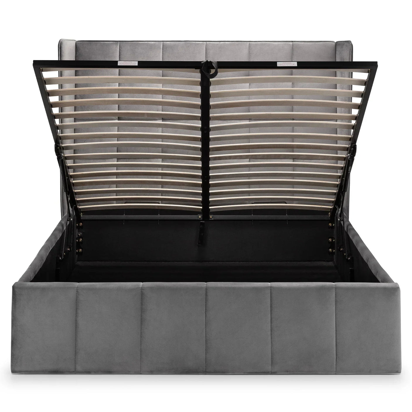 Grey ottoman bed with open lift-up storage, upholstered headboard and slatted base visible