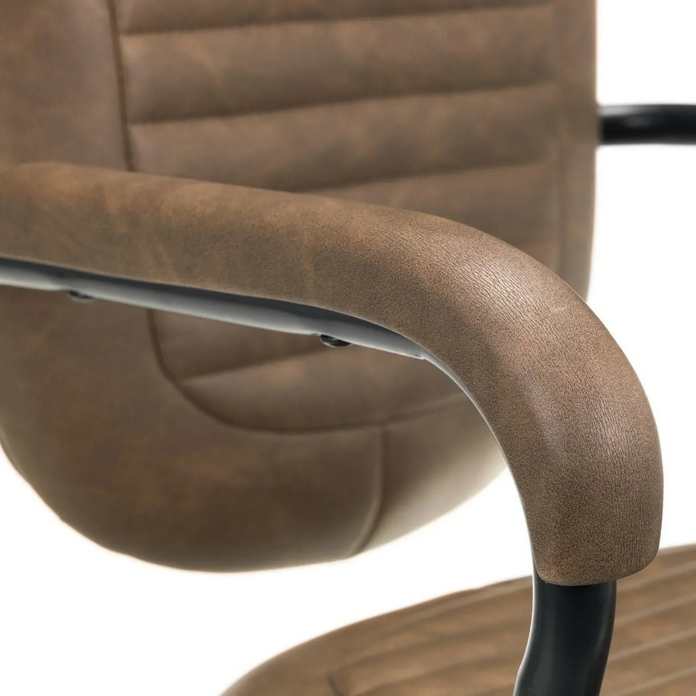 Brown swivel chair armrest and stitched seat cushion in close-up view