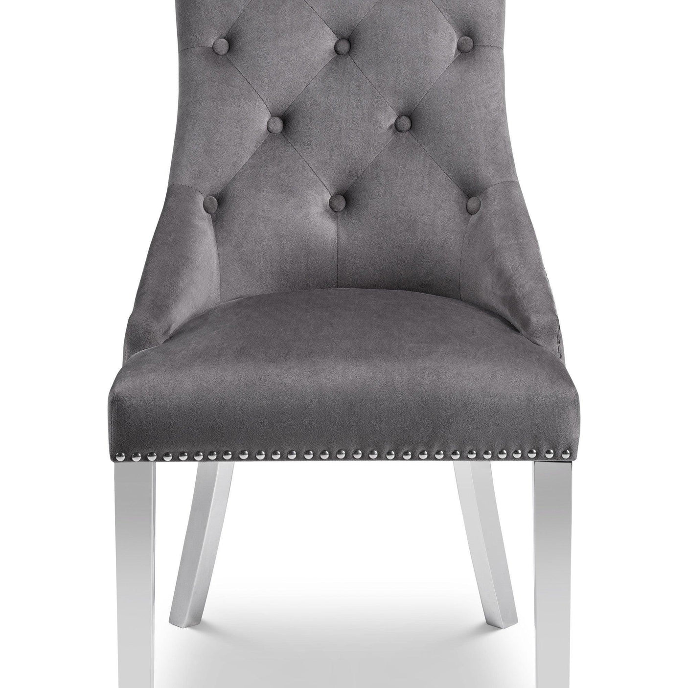 Grey velvet dining chair with button-tufted back and silver stud trim, front view