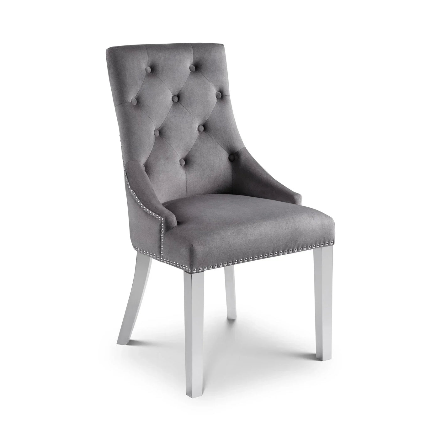 Grey velvet dining chair with button-tufted back and silver stud detailing on white legs