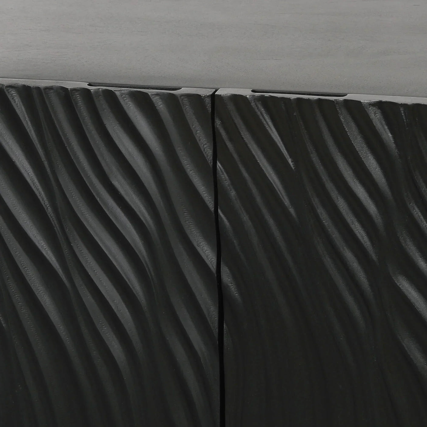 Textured black cabinet doors with wave pattern and matte finish detail