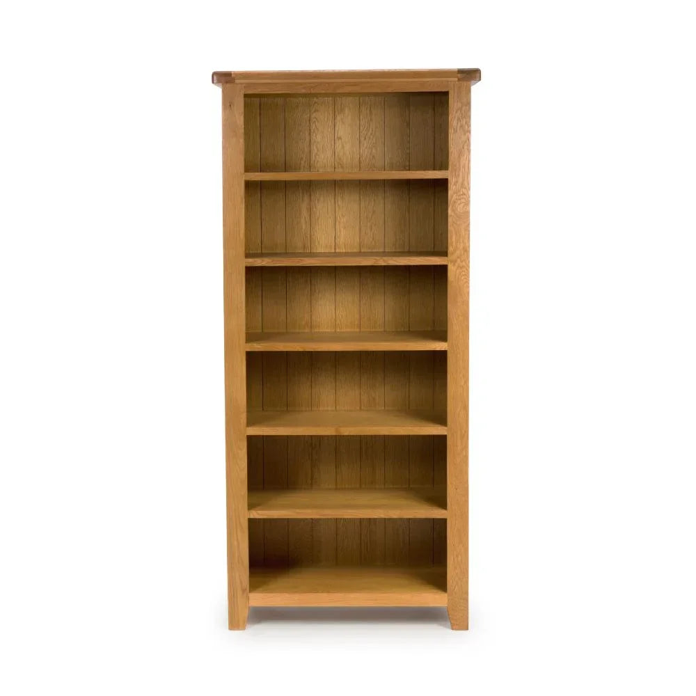 Tall oak bookcase with six shelves and panelled back, front view