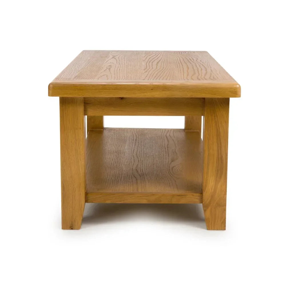 Solid oak coffee table with lower storage shelf, front view
