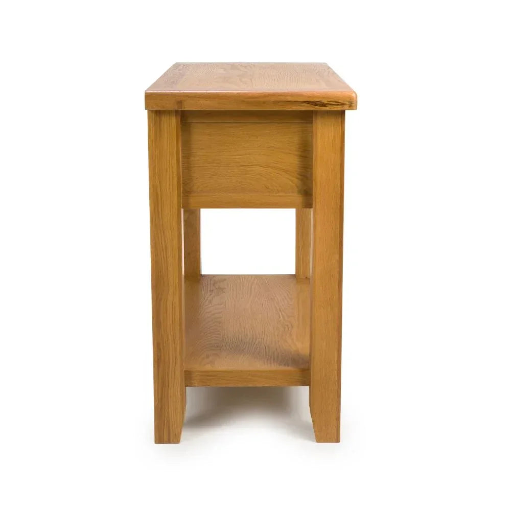 Oak side table with lower shelf, side view showing wood grain and sturdy legs
