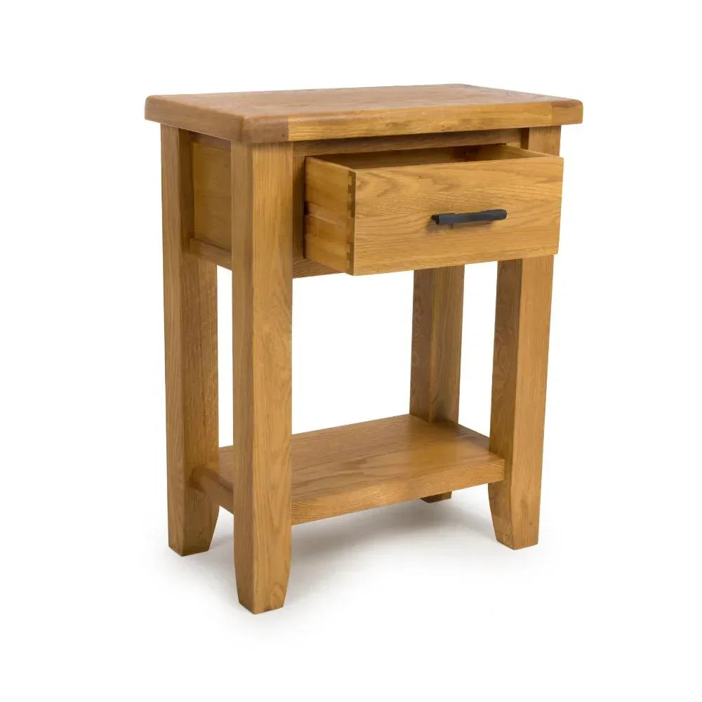 Oak bedside table with single open drawer, lower shelf, and black handle