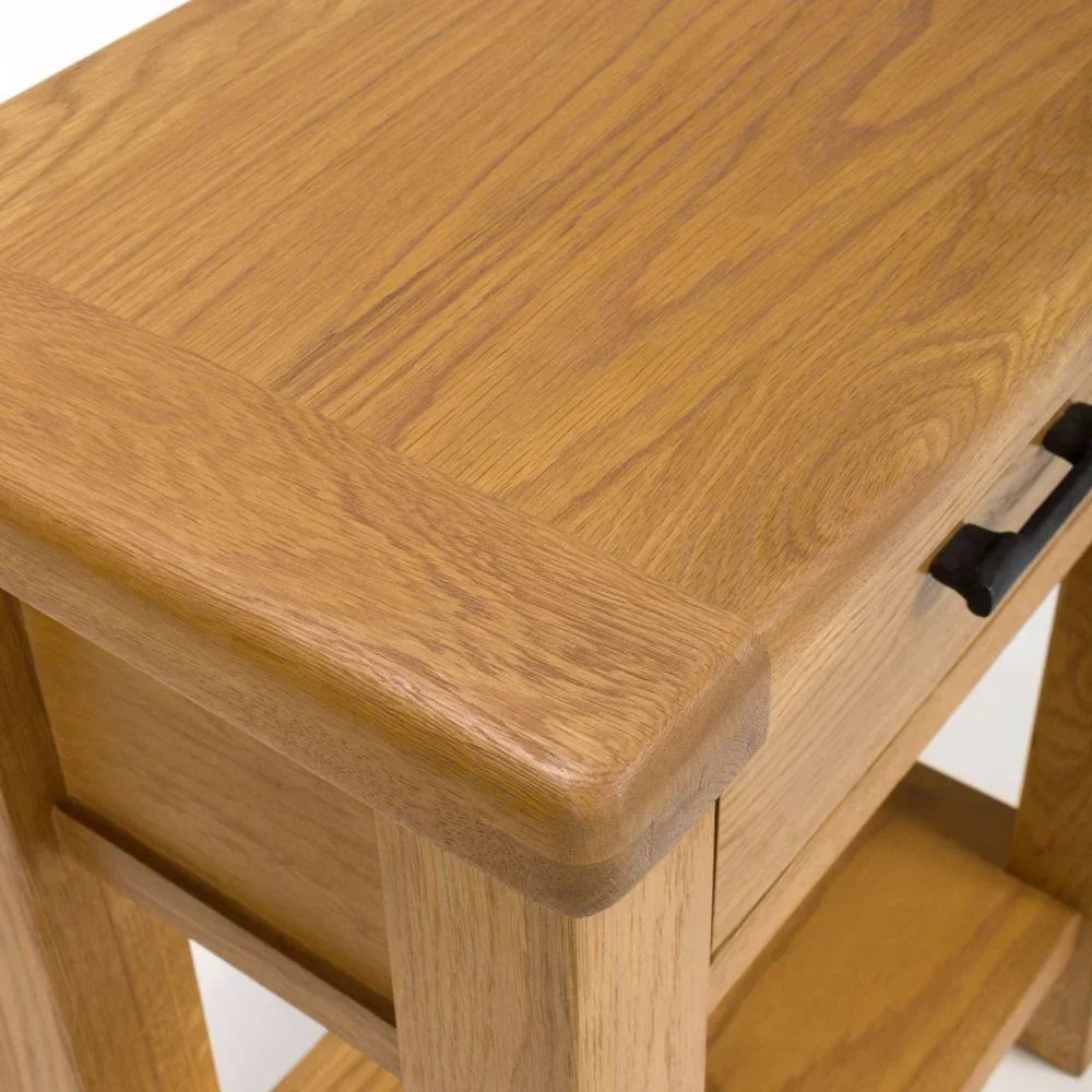 oak console table with drawer black handle and lower shelf corner detail
