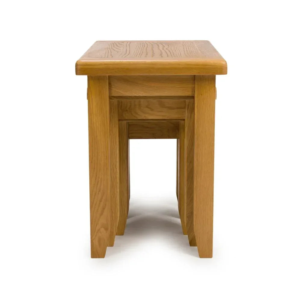oak nest of tables set with natural wood finish viewed from the front