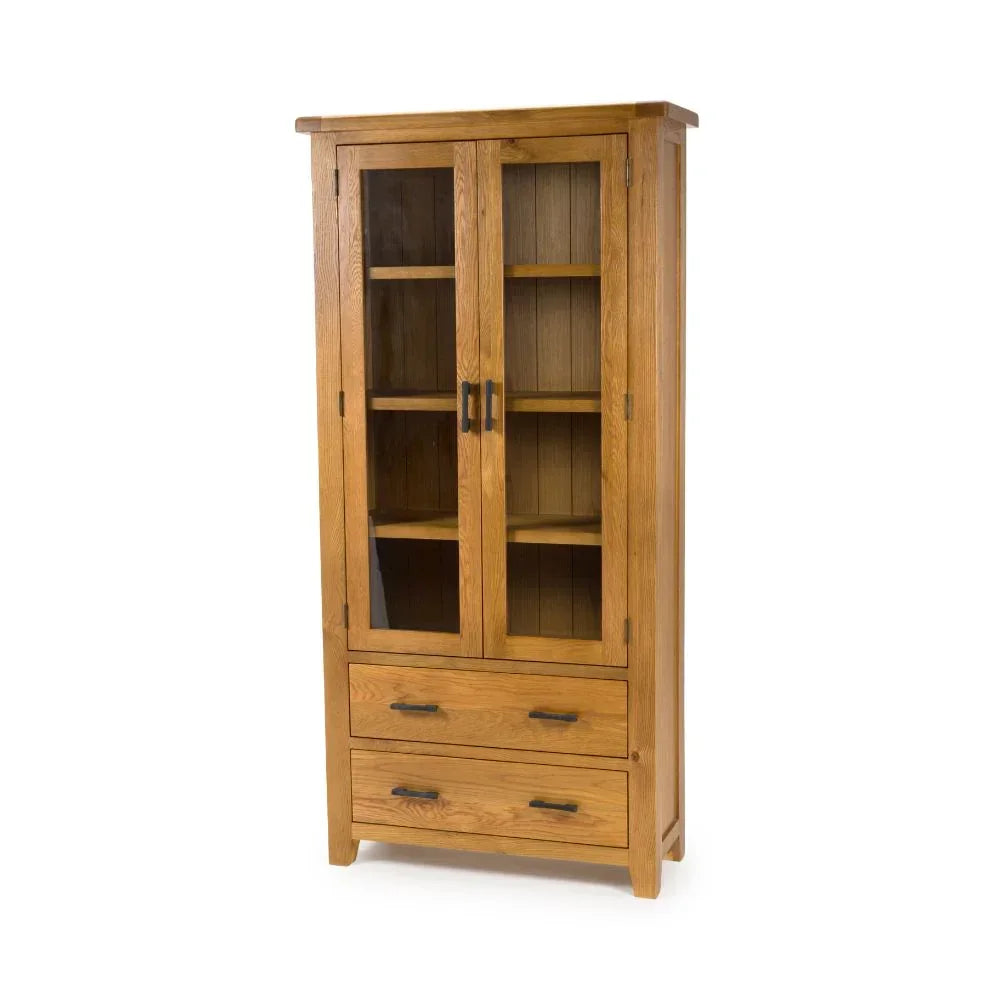 Oak display cabinet with glass doors and two storage drawers, shelving visible inside