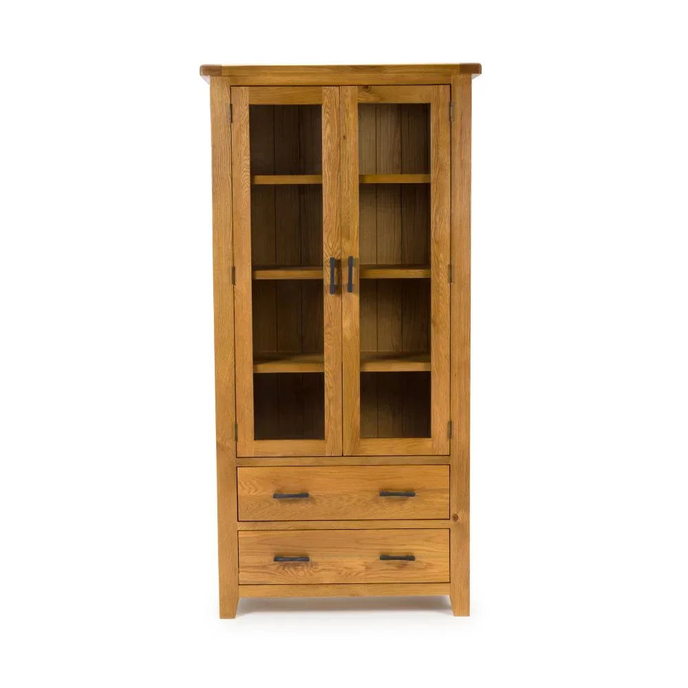 Oak display cabinet with glass doors, three shelves, and two drawers, front view