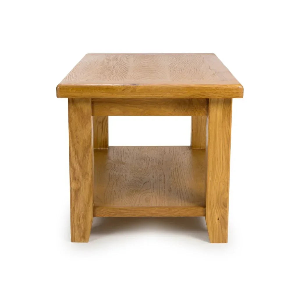 Solid oak coffee table with lower shelf, front angle view