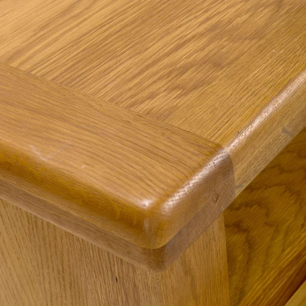 Close up of wooden furniture corner with smooth oak finish and visible wood grain