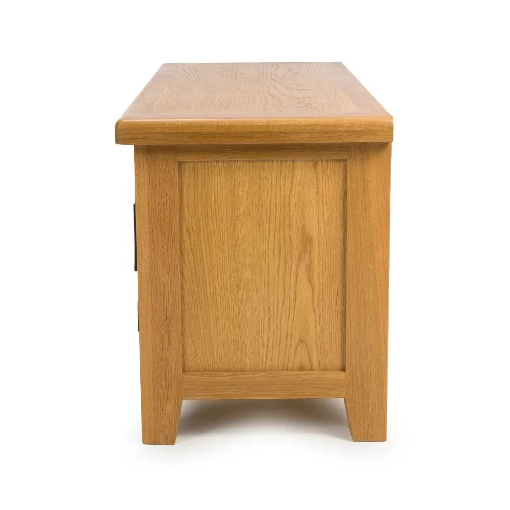 Oak storage bench side view showing wood grain and panel design