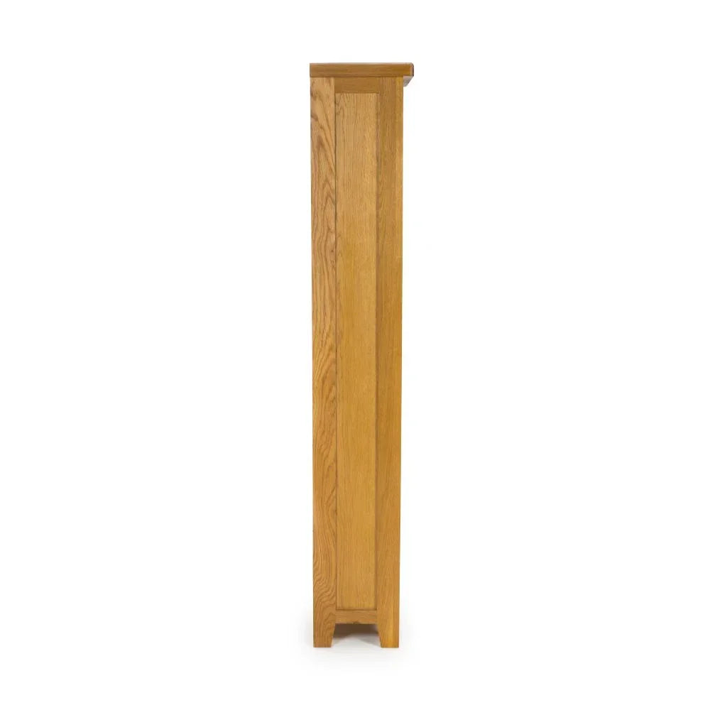 Side profile of oak cabinet with natural wood grain and panel detailing