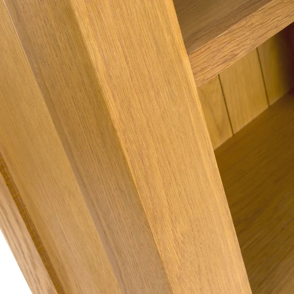 Close up of wooden bookcase frame and shelf with natural oak finish