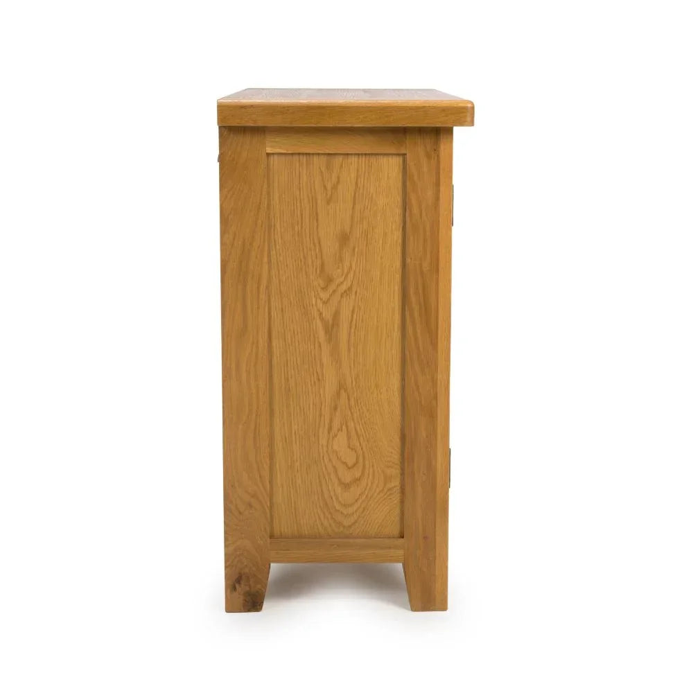 Side view of oak cabinet showing wood grain and panel detail