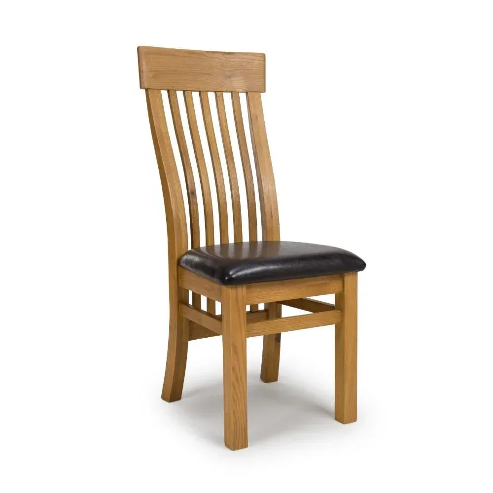 Oak dining chair with slatted backrest and black faux leather padded seat