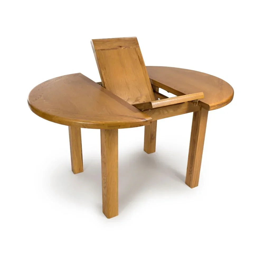 Oak extending dining table with fold-out leaf mechanism, shown partially open