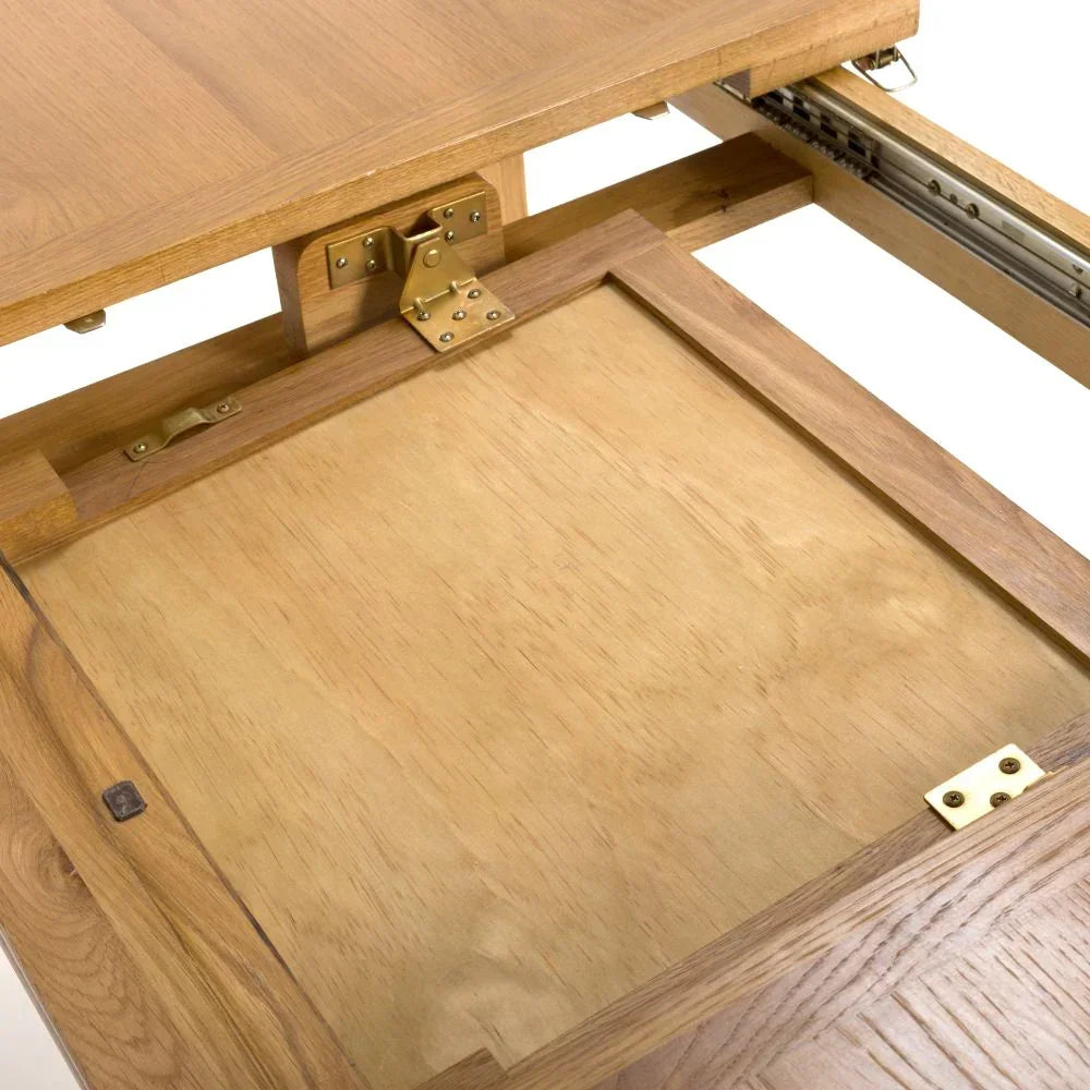 Oak extendable dining table mechanism with brass hinges and sliding track detail