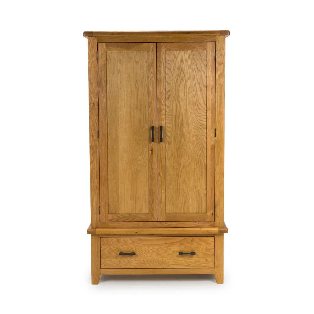 Oak wardrobe with two panel doors and single bottom drawer, front view