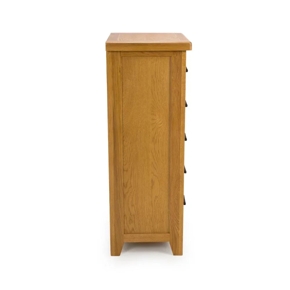 Side view of oak chest of drawers with natural wood grain finish