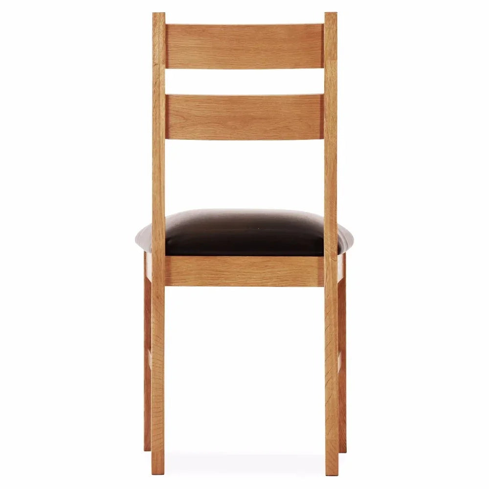 Hampton dining chair with oak frame and black padded seat, rear view