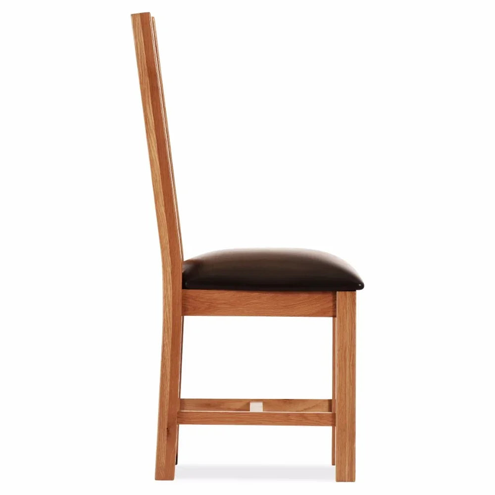 Side view oak dining chair with dark brown padded seat and high wooden backrest