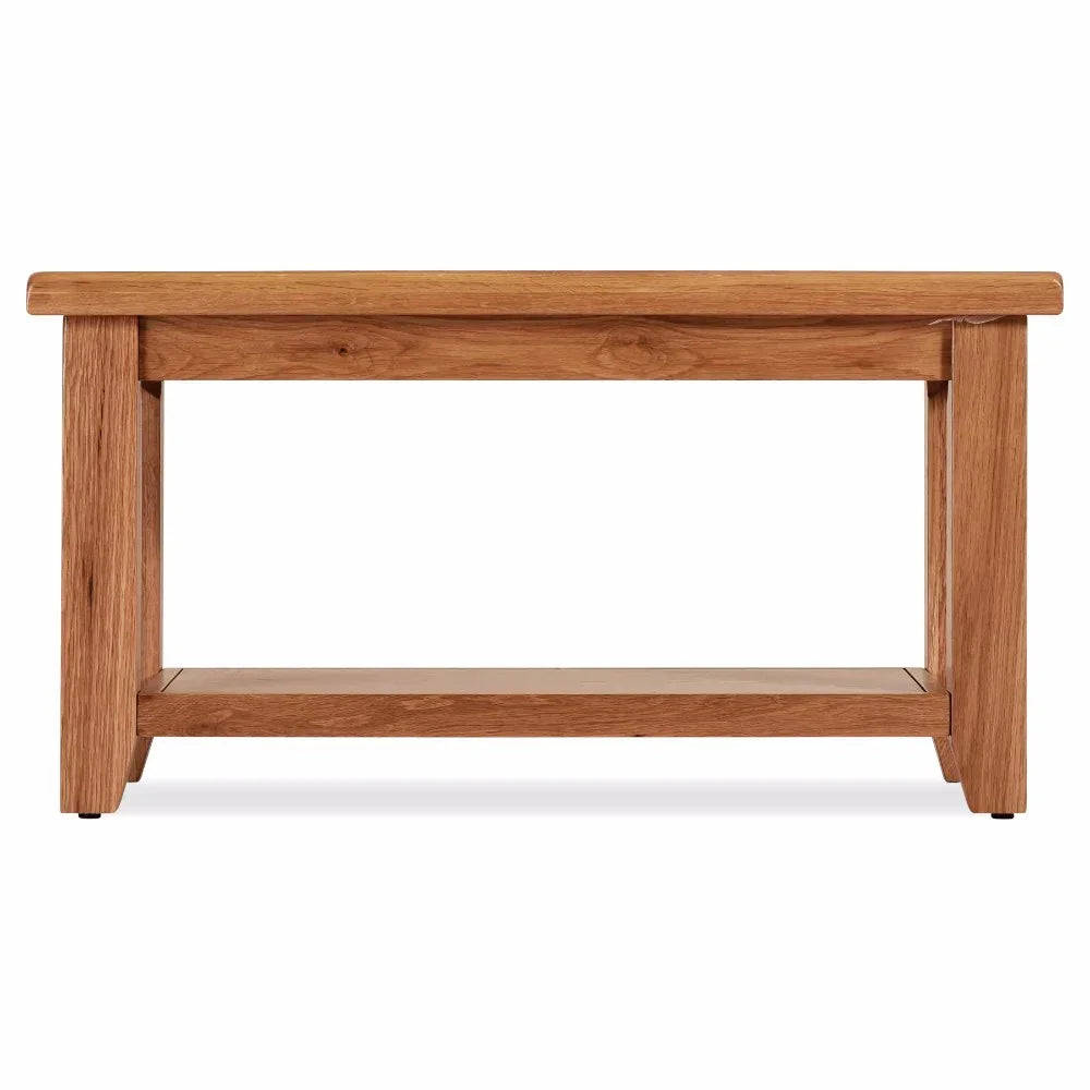 Rectangular oak coffee table with lower shelf and natural wood grain finish, front view