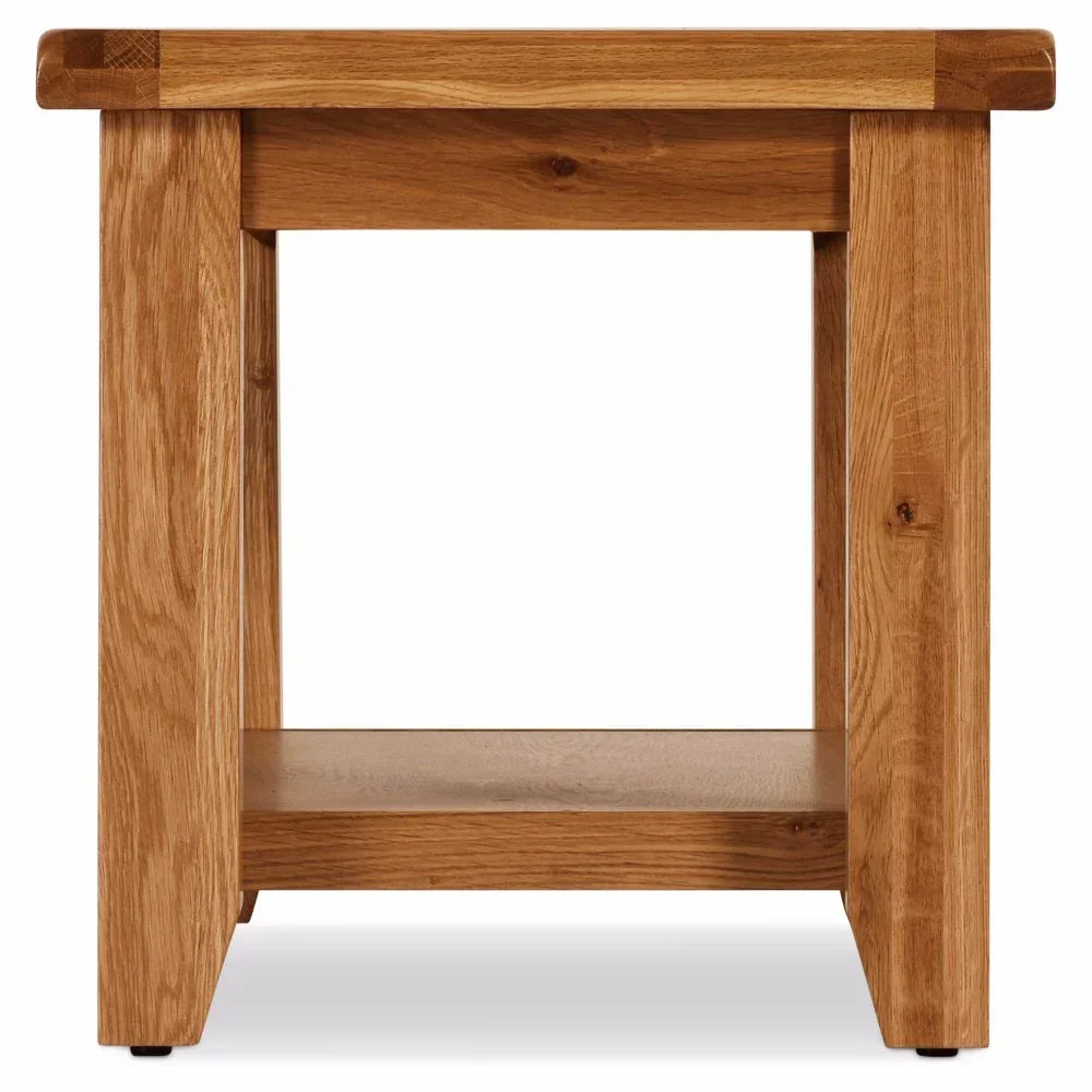 Oak coffee table with square legs and lower shelf, straight front view
